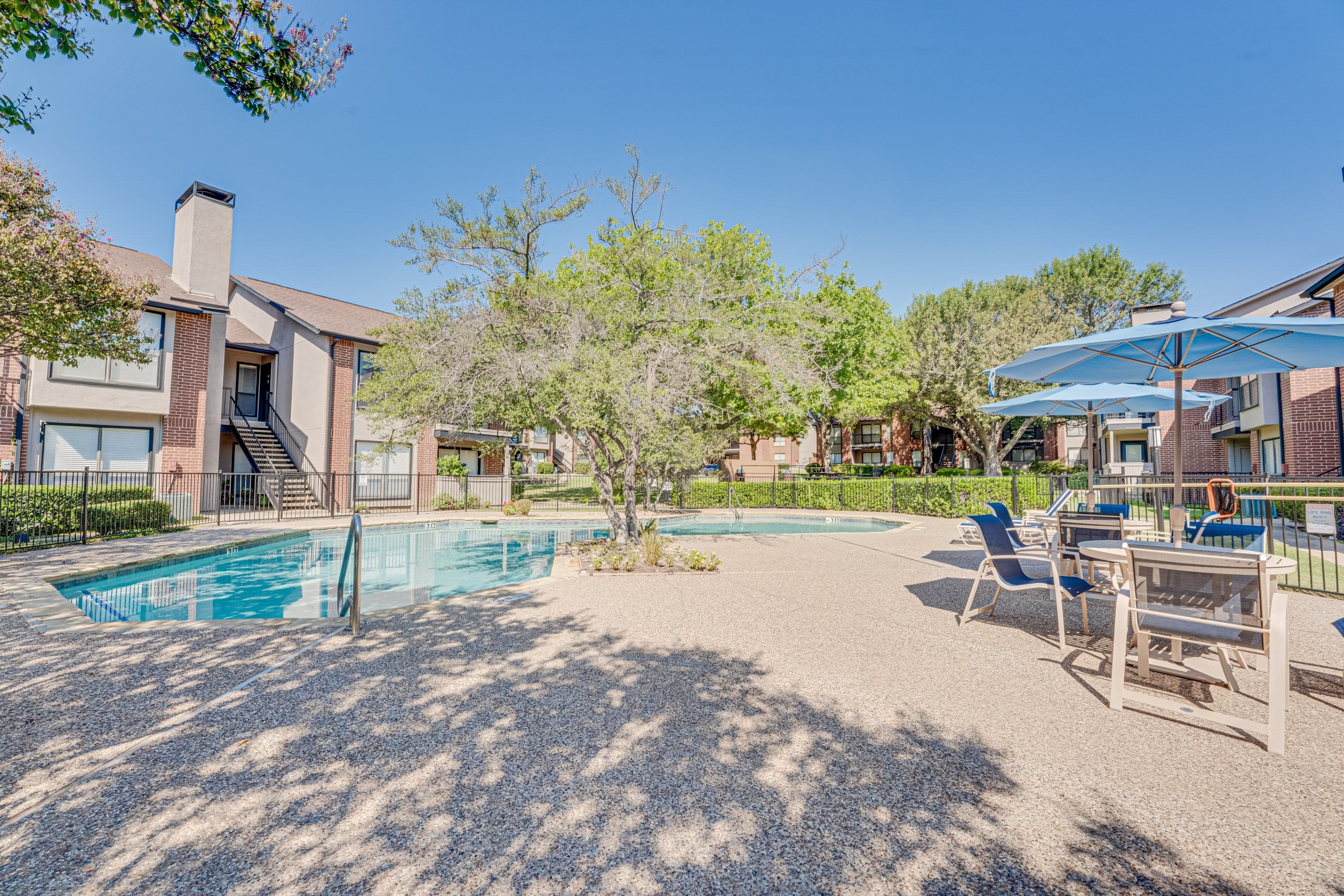 Sunny Swimming Pool Area at Bardin Oaks Apartments, Texas